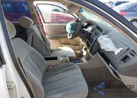 1998 Toyota Avalon Xl z USA, uszkodzony, nr VIN 4T1BF18B0WU256543